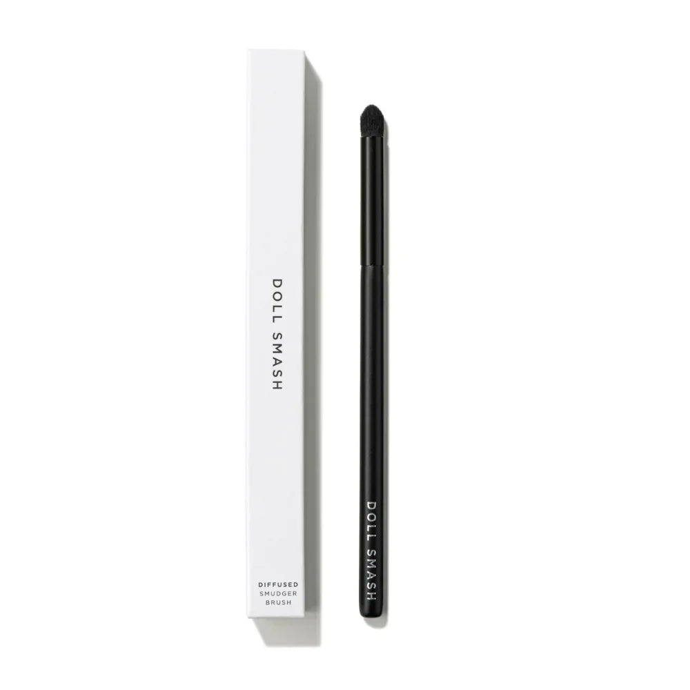 Doll Smash Diffused Smudger Brush with sleek black handle and white packaging, ideal for precise eye makeup application.