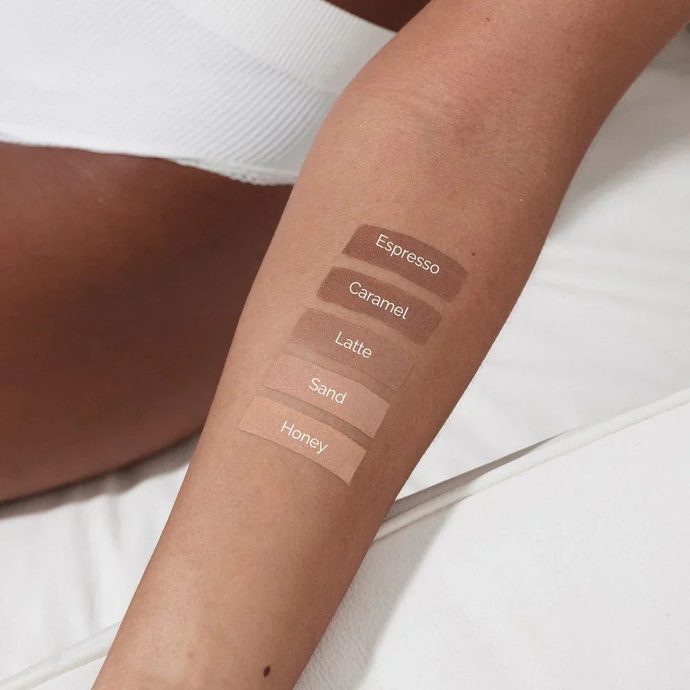 Arm swatches of Espresso, Caramel, Latte, Sand, and Honey beauty shades on warm skin tone