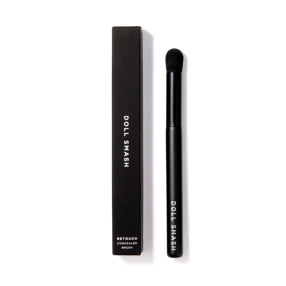 Doll Smash Retouch Concealer Brush with sleek black packaging, ideal for precise makeup application.